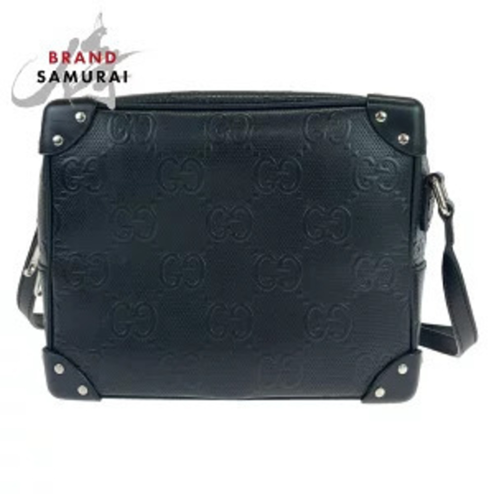 Gucci GG embossed black leather shoulder bag soft trunk